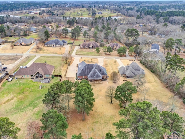 birds eye view of property with a residential view