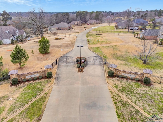 birds eye view of property with a residential view