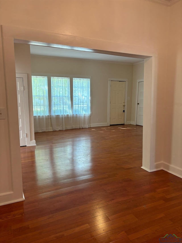 empty room featuring dark hardwood / wood-style floors