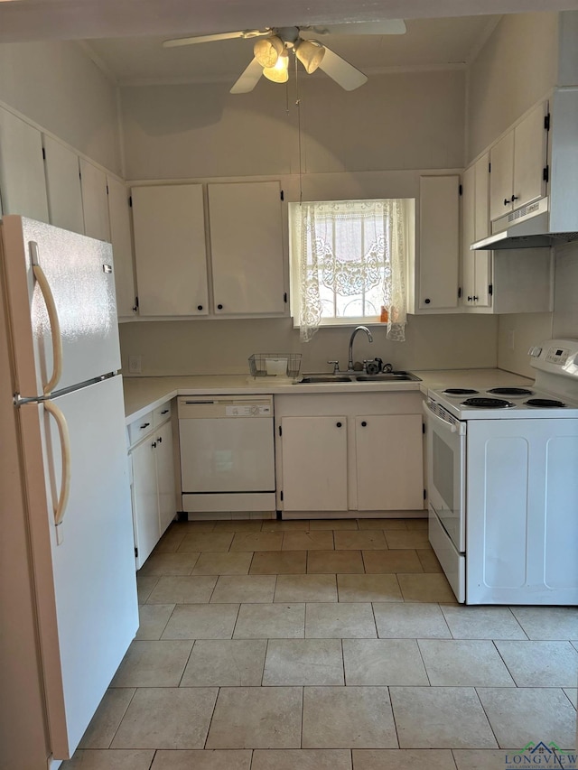 kitchen with white cabinetry, white appliances, and sink