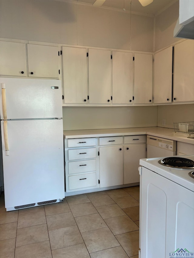 kitchen featuring white cabinets, light tile patterned floors, white appliances, and range hood