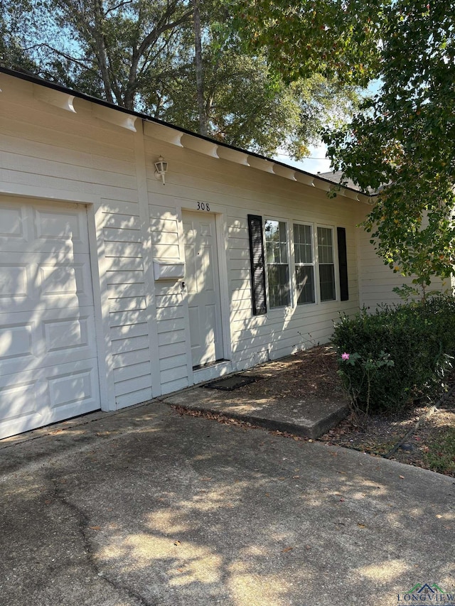 exterior space with a garage