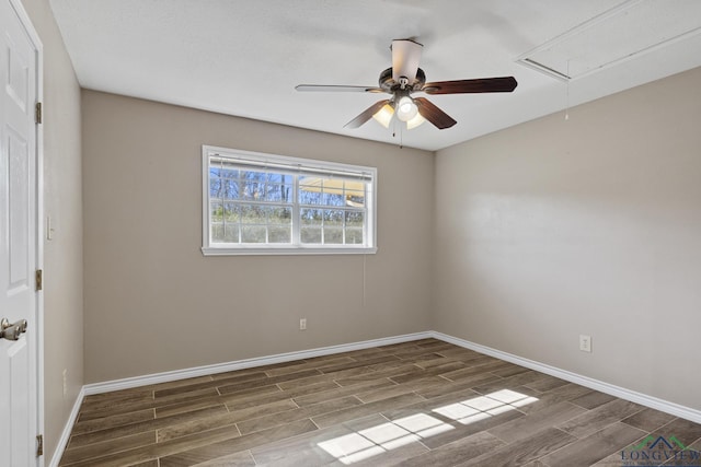 spare room with ceiling fan