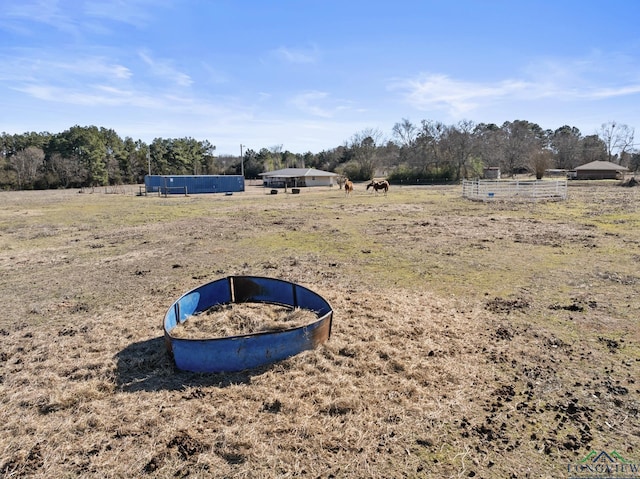 view of yard featuring a rural view