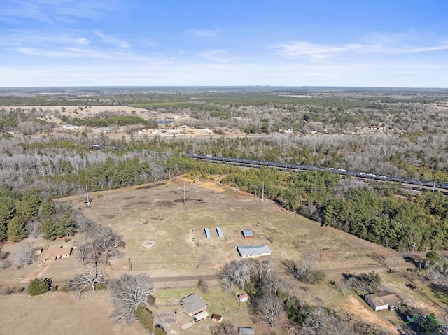 birds eye view of property with a rural view