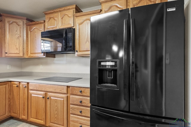 kitchen with black appliances