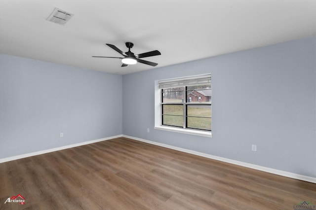 unfurnished room featuring ceiling fan and hardwood / wood-style floors