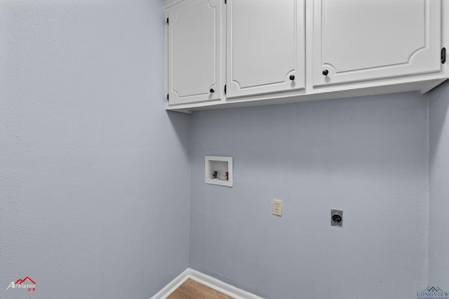 laundry room with cabinets, washer hookup, and hookup for an electric dryer