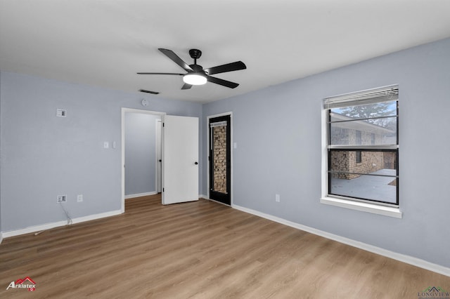 interior space featuring ceiling fan and light wood-type flooring