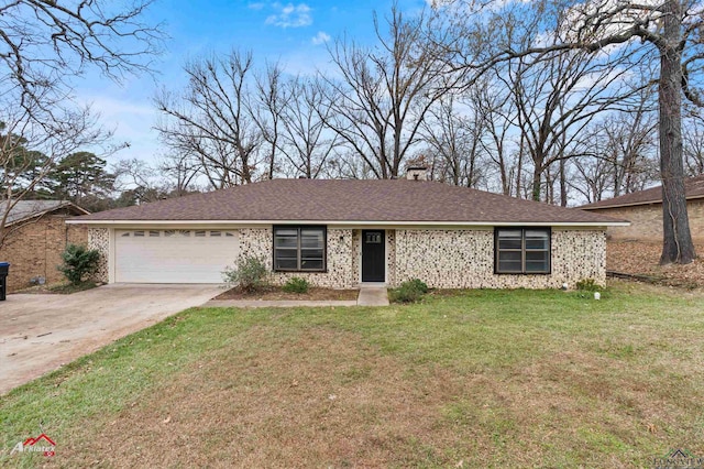 ranch-style home featuring a garage and a front yard