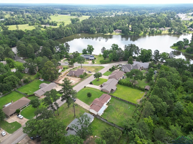 169 Hidden Frst, Longview, TX 75605 - aerial overview of property's location featuring a large body of water, nearby suburban area, and a heavily wooded area