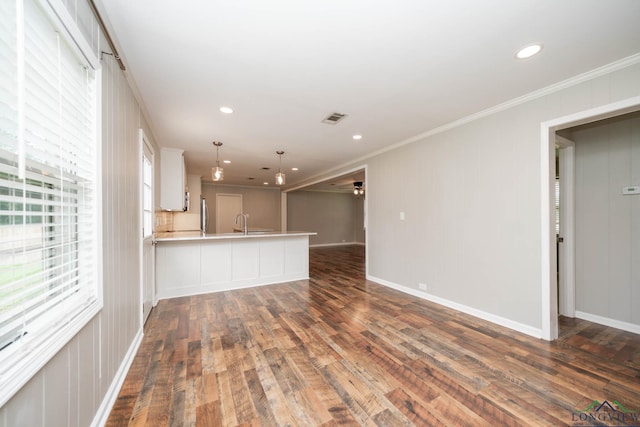 169 Hidden Frst, Longview, TX 75605 - unfurnished living room featuring dark wood-style floors, ornamental molding, recessed lighting, a ceiling fan, and a sink