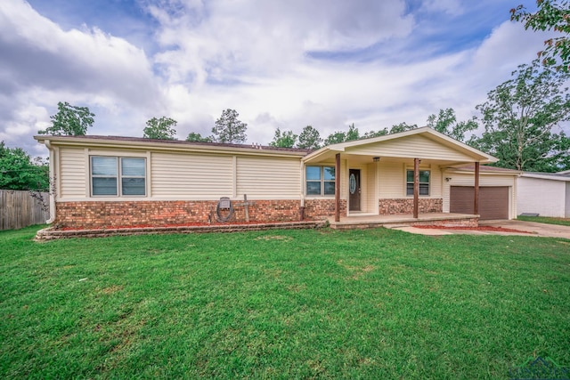 169 Hidden Frst, Longview, TX 75605 - ranch-style house featuring brick siding, covered porch, an attached garage, and driveway