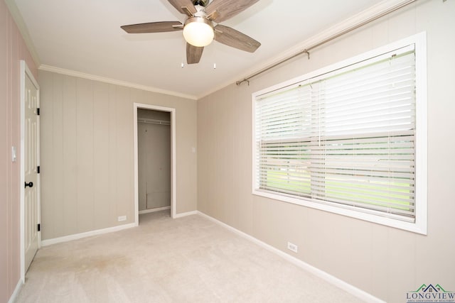 169 Hidden Frst, Longview, TX 75605 - unfurnished bedroom with ornamental molding, light carpet, baseboards, a closet, and a ceiling fan