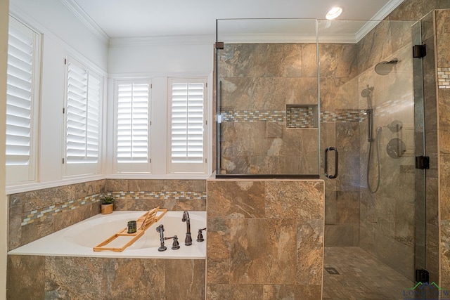 full bath with a garden tub, a shower stall, and crown molding