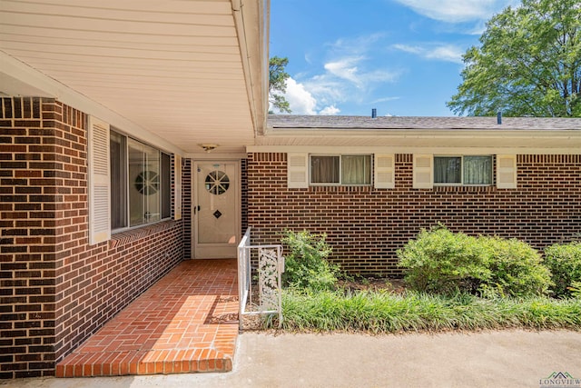201 Bronco Ln, Linden, TX 75563 - doorway to property featuring brick siding