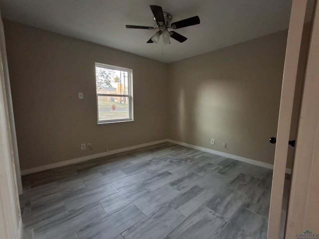 spare room featuring ceiling fan