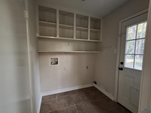 washroom featuring washer hookup, electric dryer hookup, and dark tile patterned flooring