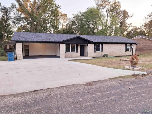 single story home with a carport