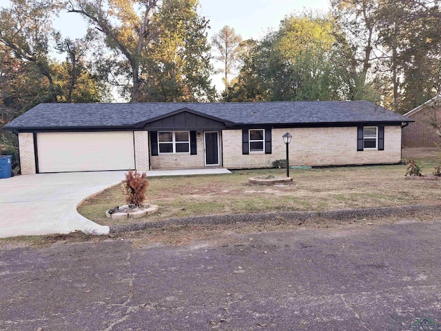 ranch-style home featuring a garage