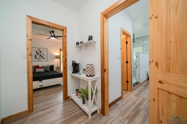 hallway featuring light hardwood / wood-style floors