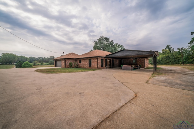 ranch-style home featuring a garage