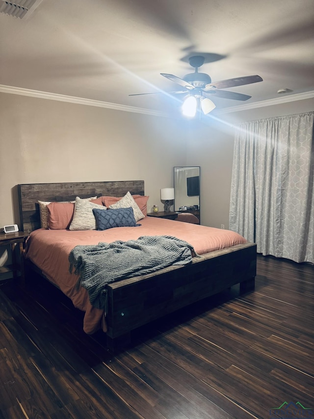 505 Timberdale, Kilgore, TX 75662 - bedroom with ornamental molding, wood finished floors, and a ceiling fan
