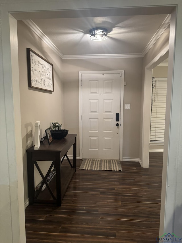 505 Timberdale, Kilgore, TX 75662 - entryway featuring dark wood-style flooring, baseboards, and crown molding