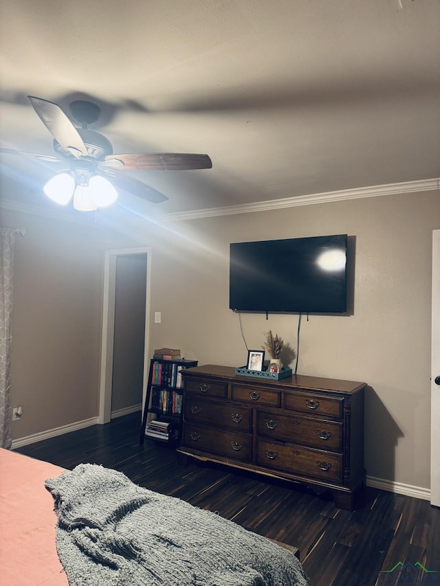 505 Timberdale, Kilgore, TX 75662 - bedroom featuring ornamental molding, dark wood-type flooring, baseboards, and ceiling fan