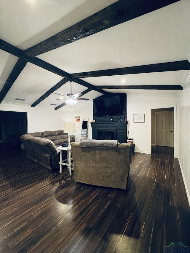 505 Timberdale, Kilgore, TX 75662 - living room featuring wood finished floors, baseboards, a ceiling fan, and a brick fireplace