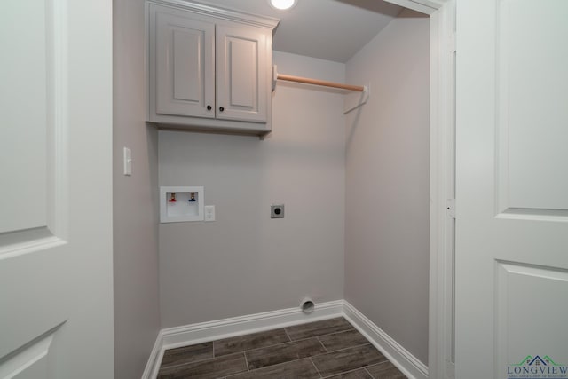 laundry area featuring cabinets, hookup for a washing machine, and electric dryer hookup