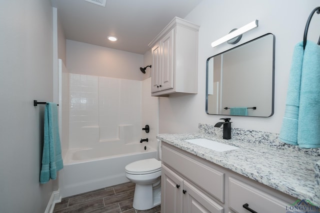 full bathroom with vanity, shower / bathing tub combination, and toilet