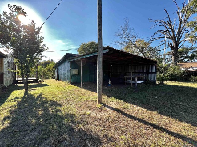 227 County Road 2997, Hughes Springs, TX 75656 - exterior space with an outbuilding