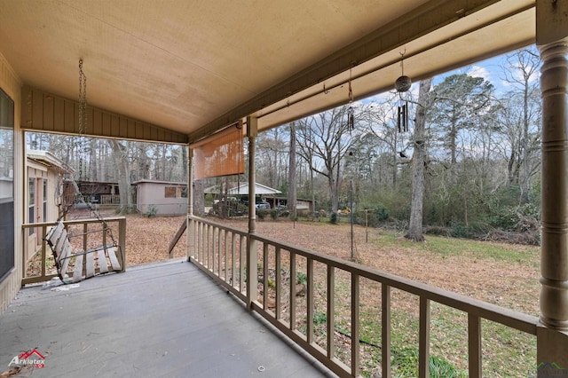 balcony featuring a porch