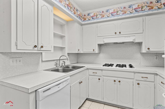 kitchen featuring light countertops, white cabinets, a sink, white appliances, and under cabinet range hood