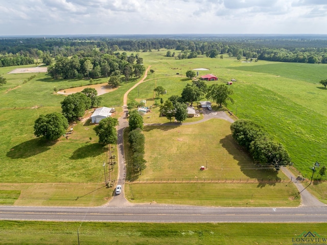 birds eye view of property featuring a rural view