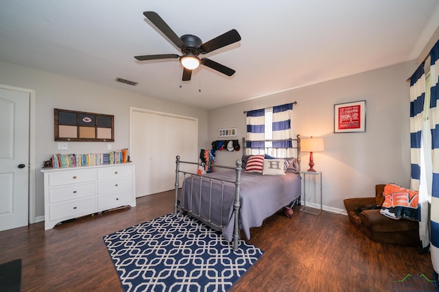 bedroom featuring dark hardwood / wood-style floors and ceiling fan