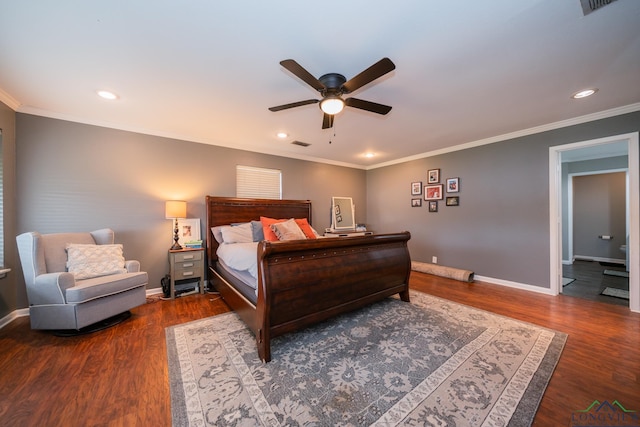 bedroom featuring ceiling fan, crown molding, and dark hardwood / wood-style floors