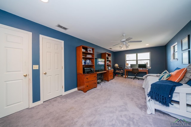 interior space with ceiling fan