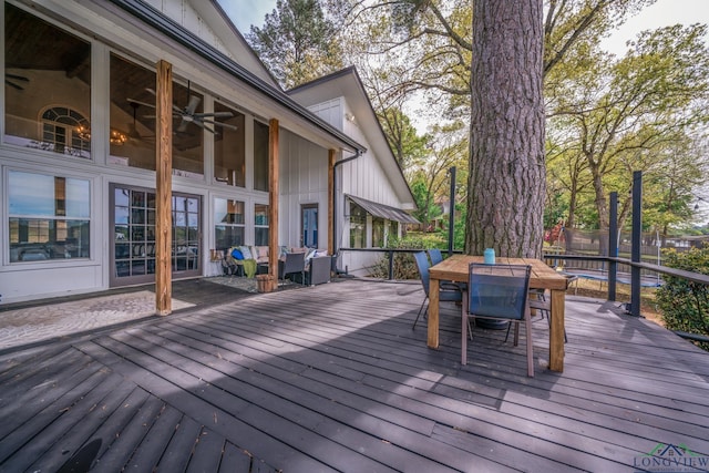 deck with ceiling fan and a trampoline