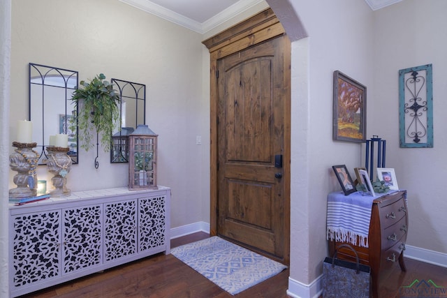 905 Woodridge Cir, Longview, TX 75601 - foyer featuring arched walkways, ornamental molding, wood finished floors, and baseboards