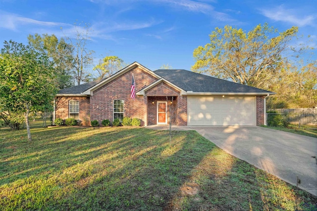 ranch-style house with a front yard and a garage