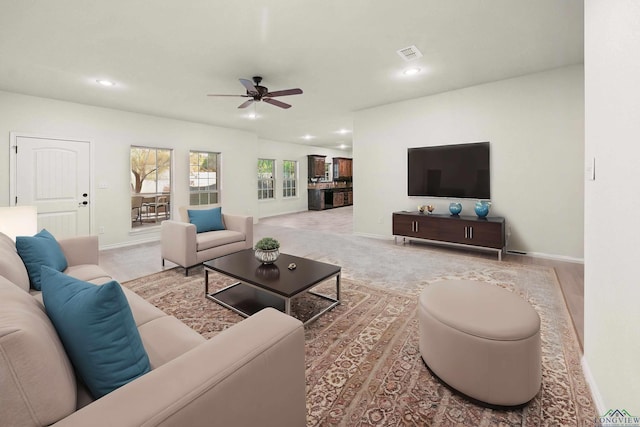 living room featuring ceiling fan