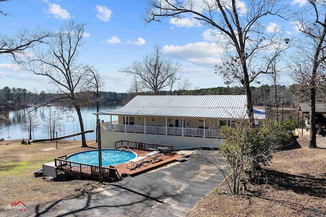 exterior space with a water view