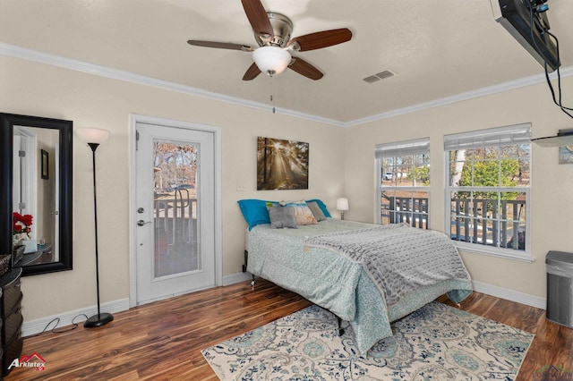 bedroom featuring dark wood-type flooring, ceiling fan, crown molding, and access to exterior