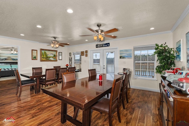 dining space featuring ornamental molding, dark hardwood / wood-style floors, a textured ceiling, and french doors