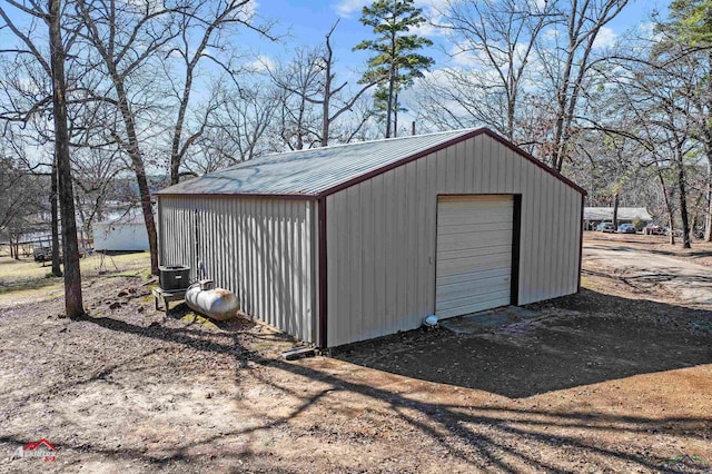 view of outbuilding featuring a garage