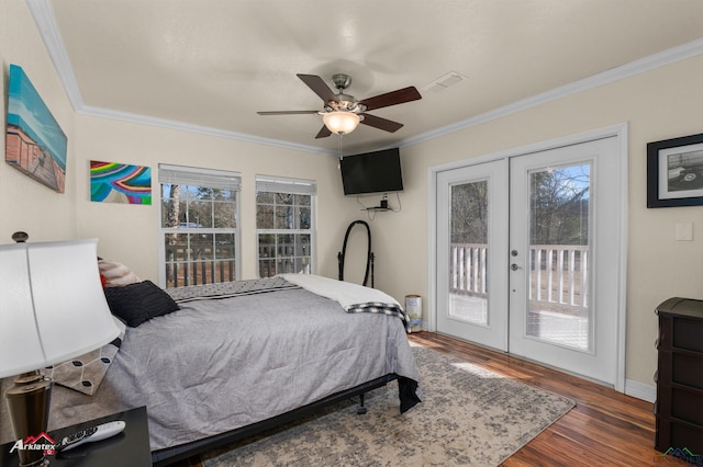 bedroom with dark hardwood / wood-style floors, access to exterior, ceiling fan, crown molding, and french doors