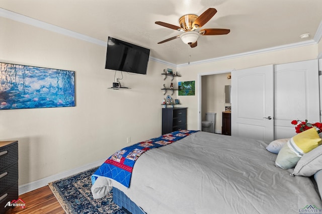 bedroom with connected bathroom, crown molding, wood-type flooring, and ceiling fan