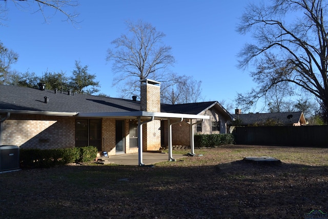 rear view of property with a patio